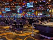 How do blockchain lottery tickets differ from paper versions?