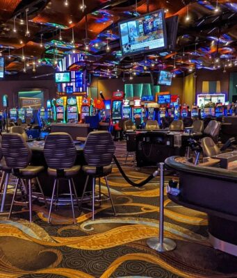 How do blockchain lottery tickets differ from paper versions?